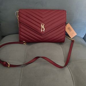 Steve Madden wine clutch read description